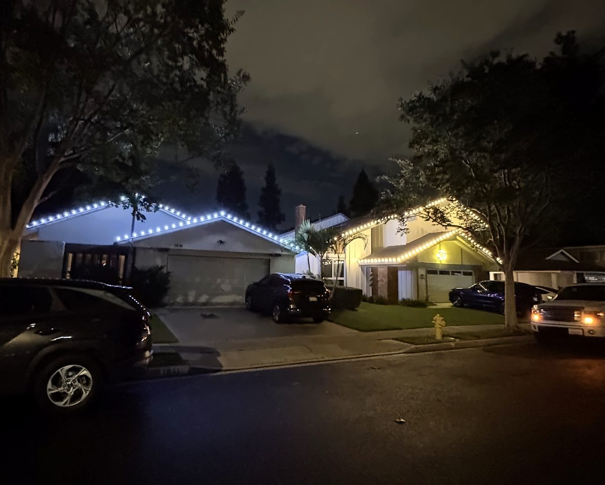Warm white rooflines on two neighbors' homes